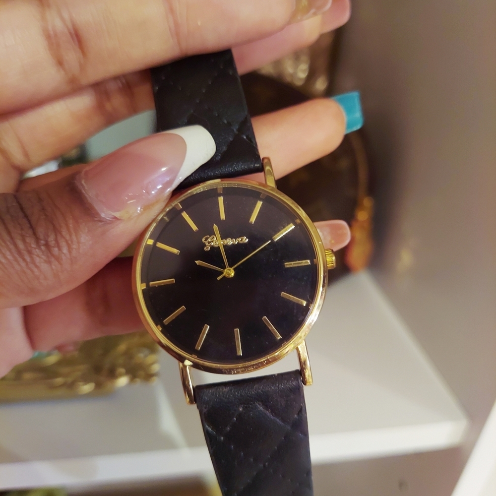 Black and gold watch